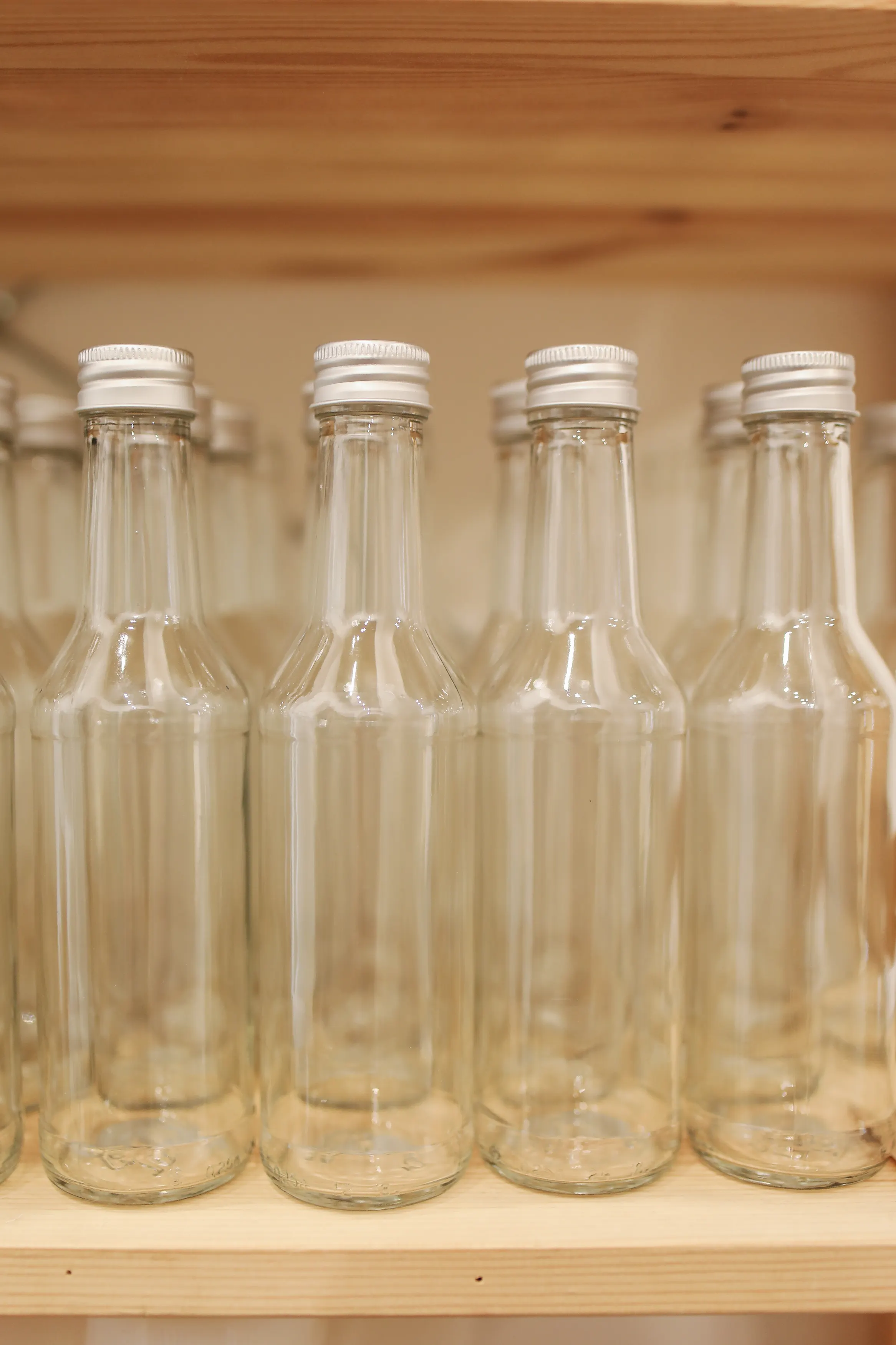 Glass vs Plastic vs Aluminium Packaging: How to Choose the Right Material for Your Product | Awais Khadim Packaging Design