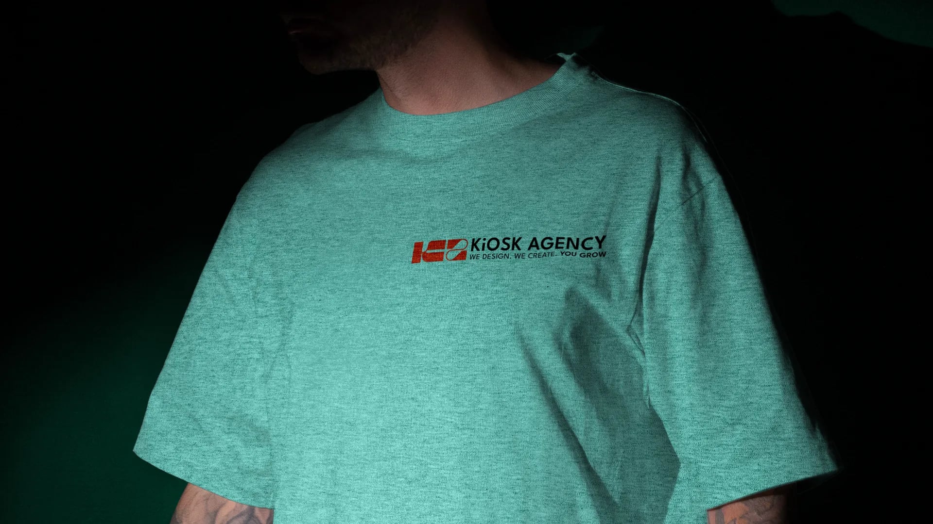 Kiosk Agency logo on a t-shirt